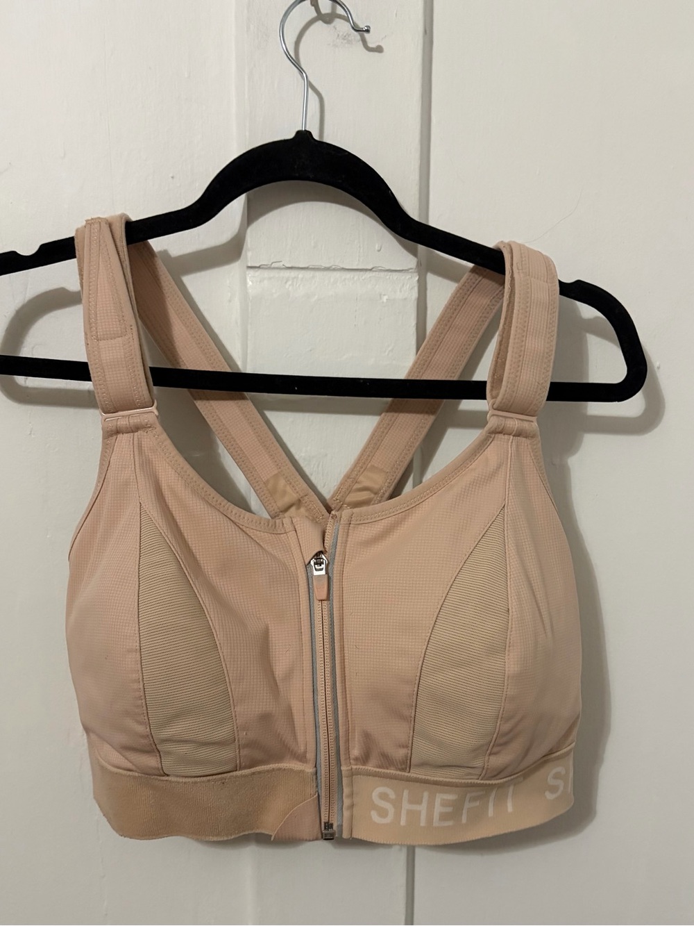SHEFIT Ultimate Sports Bra in the Sandstorm (tan/nude) colorway. ®